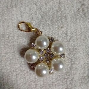 Goldtone faux pearl crystal charm pendant